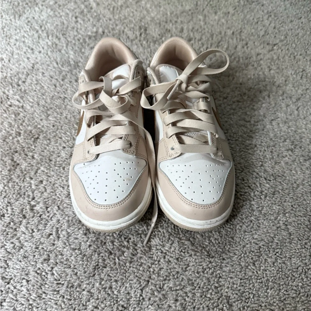 Nike dunks low gold swoosh